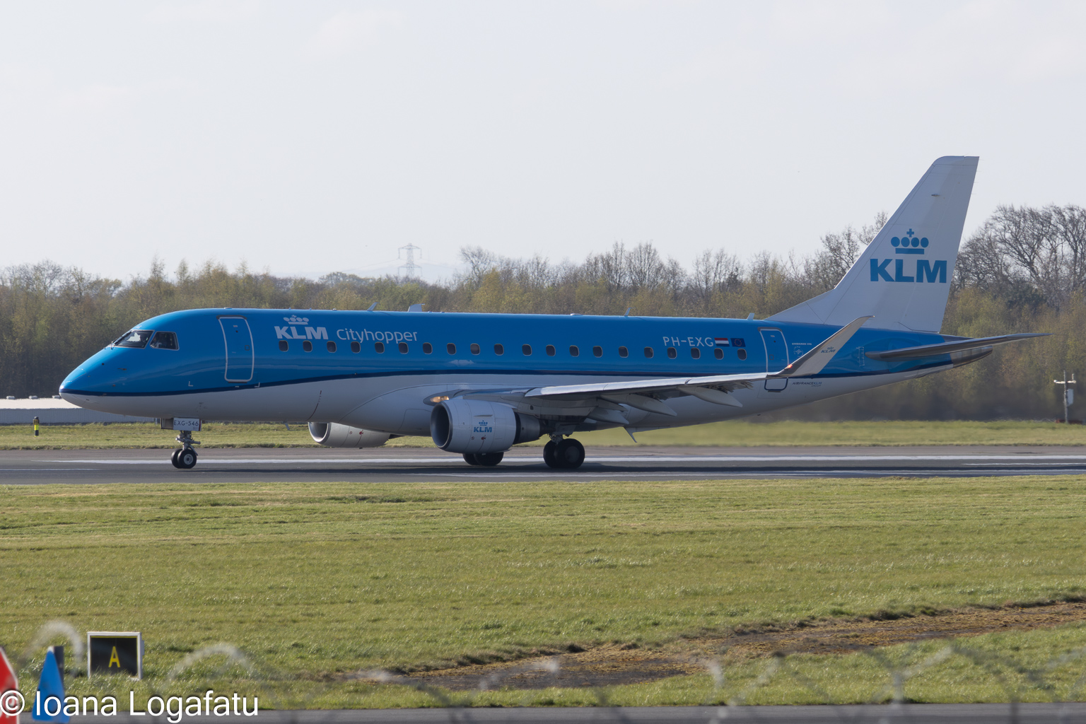 Jet taking off from the runway at sunset